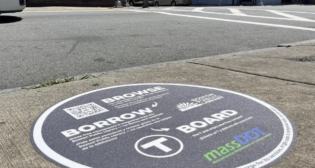 The “Browse, Borrow, Board” program provides MBTA riders free access to digital news and e-book content during the nearly two-month-long closure of Boston’s Sumner Tunnel, which is being repaired. (MassDOT Photograph)
